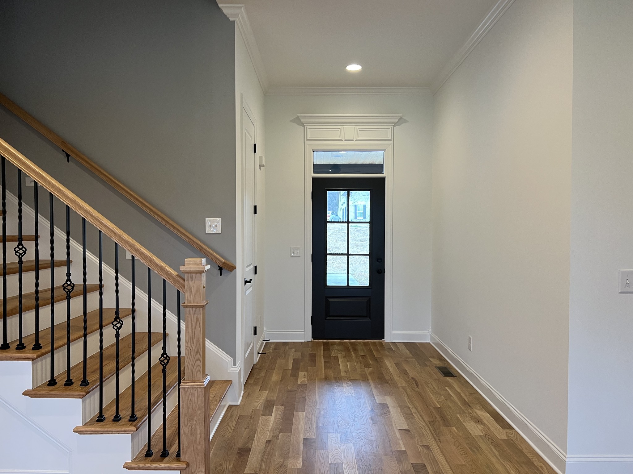 1059 Hideaway Road Columbia, TN 38401 - Photo 2 of 15 a view of hallway with wooden floor and stairs