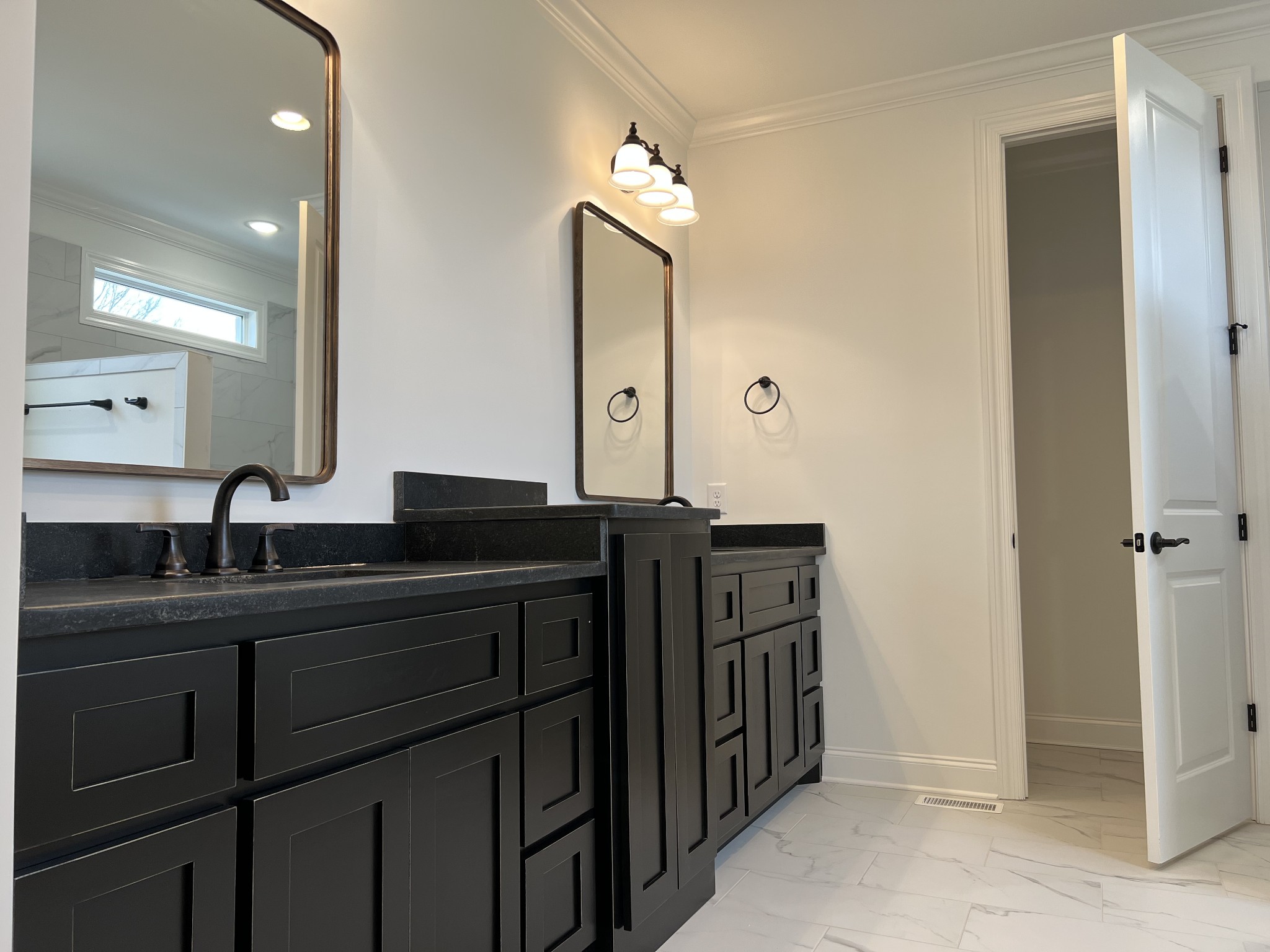 1059 Hideaway Road Columbia, TN 38401 - Photo 7 of 15 a bathroom with double vanity sinks and a mirror
