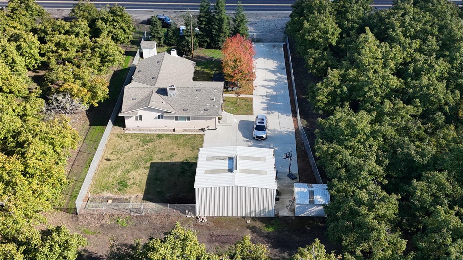 5331 Geer Road Hughson, CA 95326 - Photo 2 of 12 an aerial view of a house with outdoor space