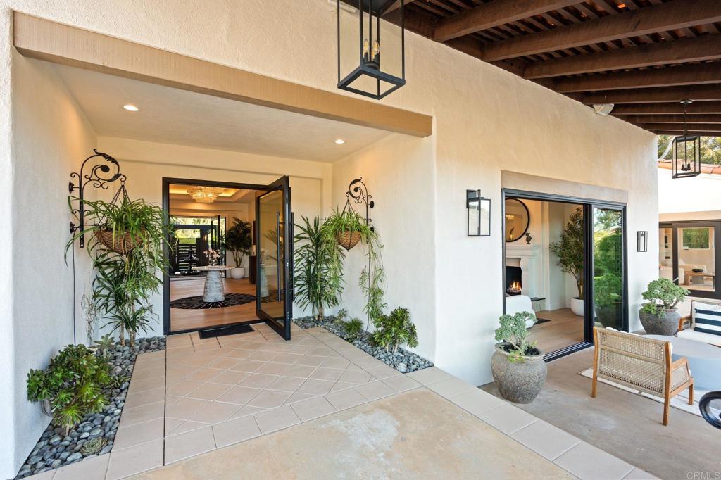 528 Flores De Oro Rancho Santa Fe, CA 92067 - Photo 12 of 75 a lobby with furniture and potted plants