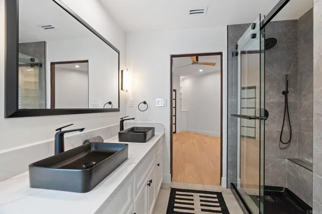 a view of a kitchen with sink washer and dryer