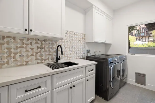 a view of a house with pool outdoor seating area