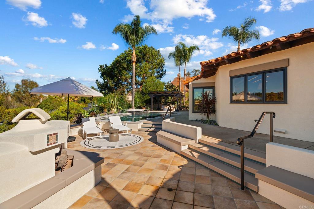 528 Flores De Oro Rancho Santa Fe, CA 92067 - Photo 67 of 75 a view of a patio with swimming pool