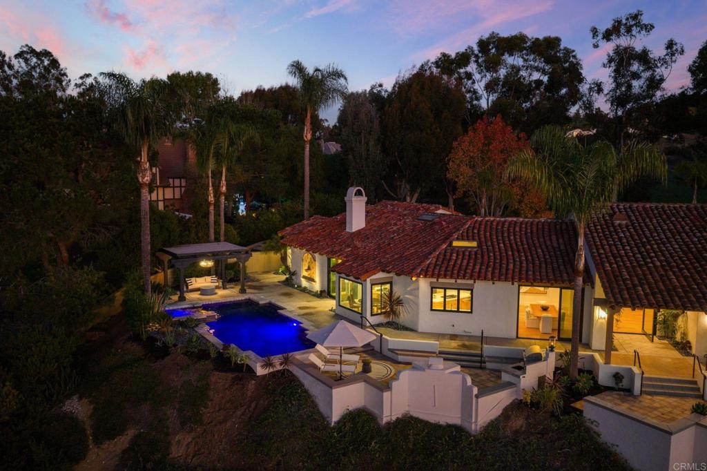 528 Flores De Oro Rancho Santa Fe, CA 92067 - Photo 73 of 75 a view of a house with a yard fire pit and outdoor seating
