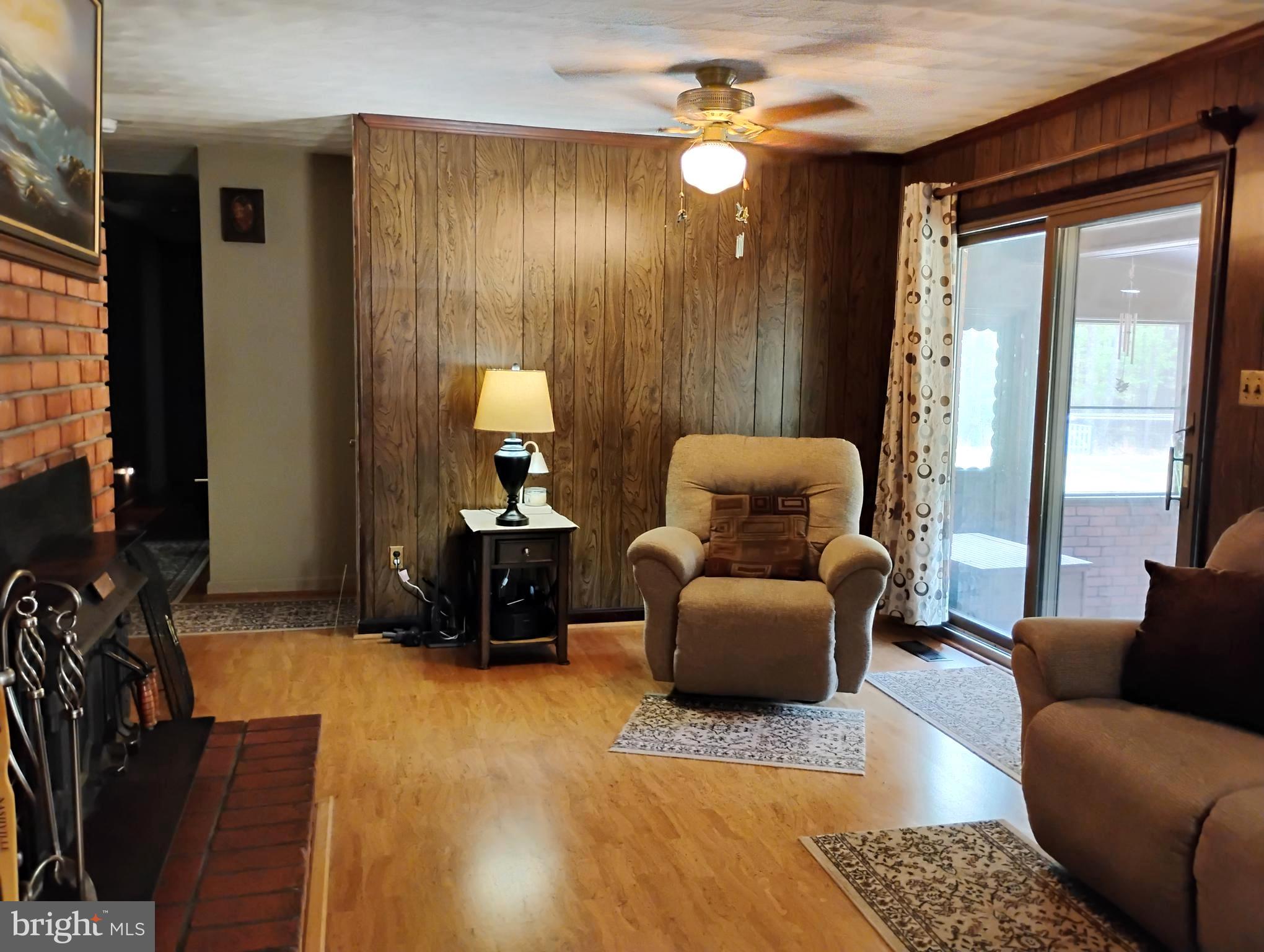 12266 Elk Run Church Road Midland, VA 22728 - Photo 13 of 67 Family room with SGD to screened porch