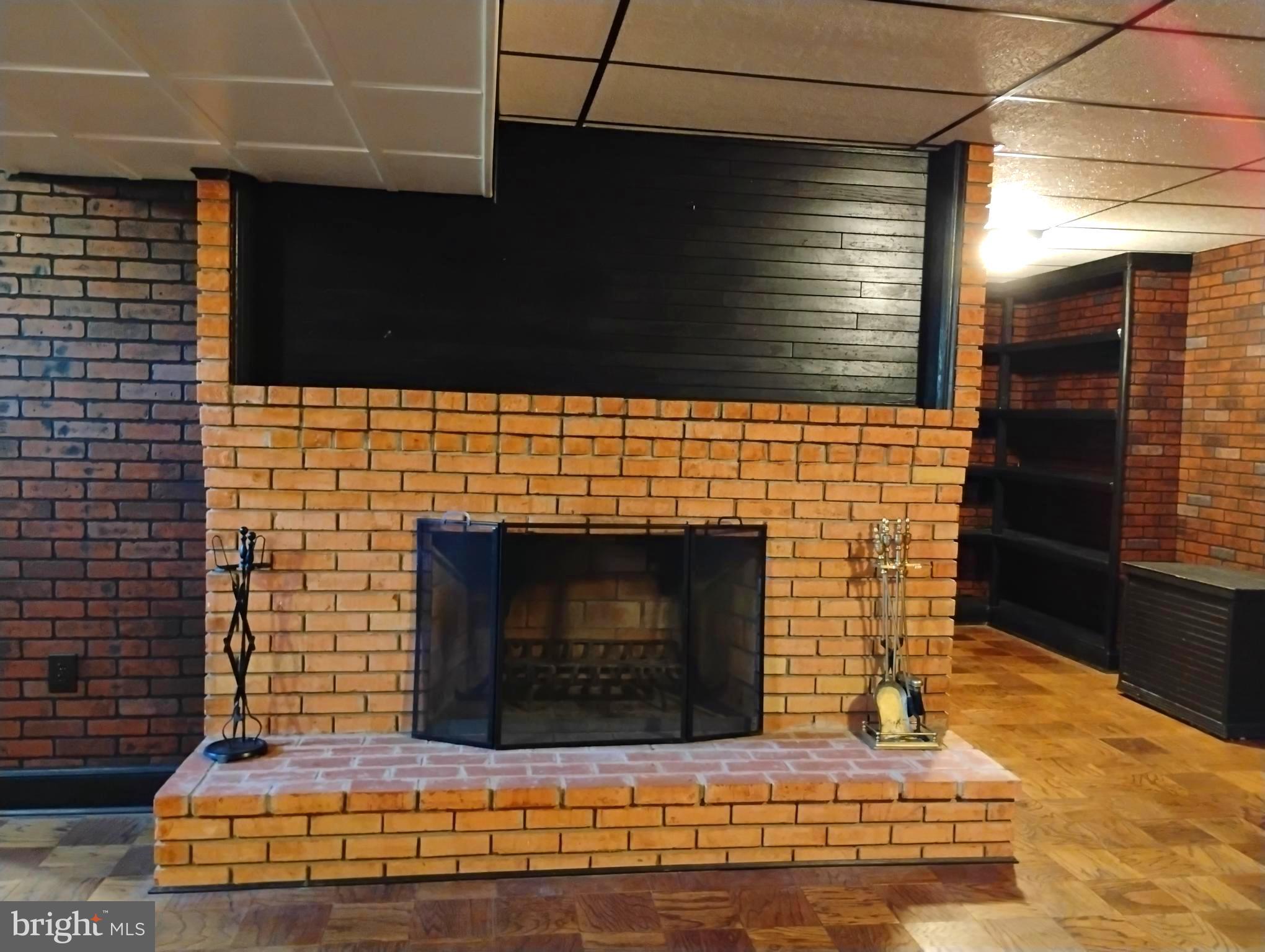 12266 Elk Run Church Road Midland, VA 22728 - Photo 29 of 67 Working fireplace with screen