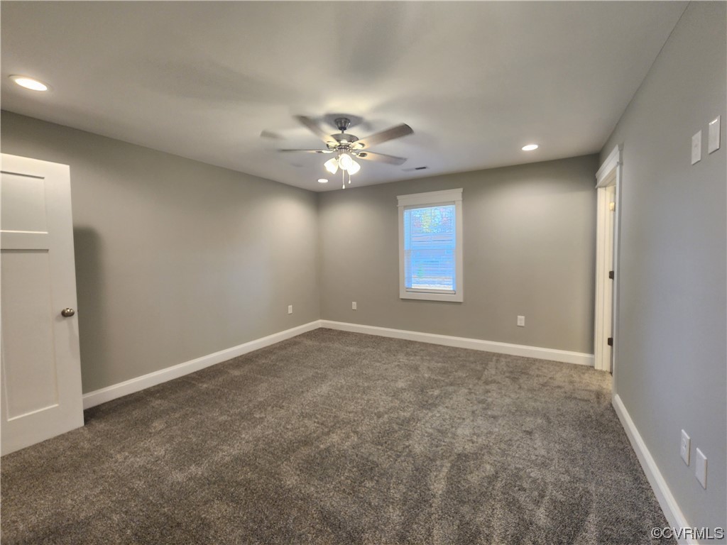 310 Jarratt Jarratt, VA 23867 - Photo 17 of 17 an empty room with windows and ceiling fan