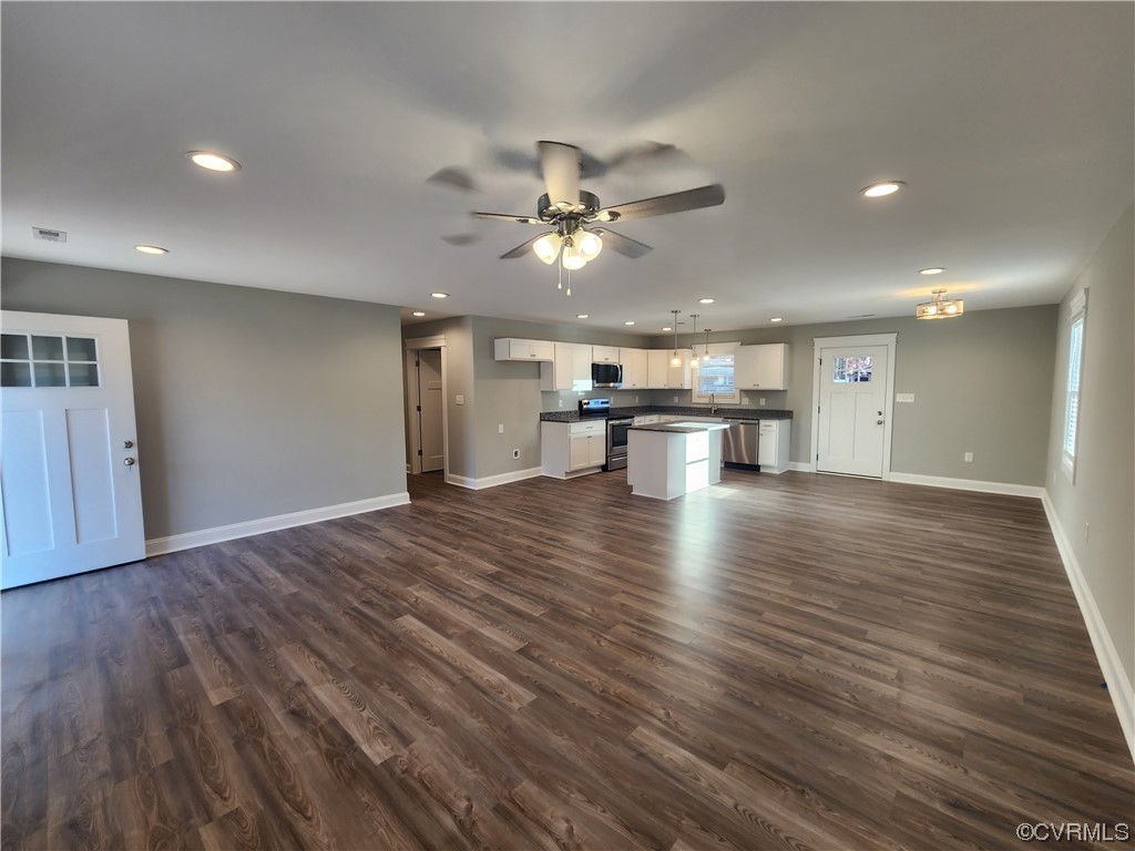 310 Jarratt Jarratt, VA 23867 - Photo 4 of 17 a view of kitchen with cabinets and wooden floor