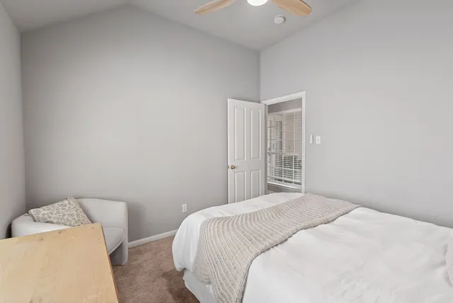 a bathroom with double vanity sinks a vanity and a mirror