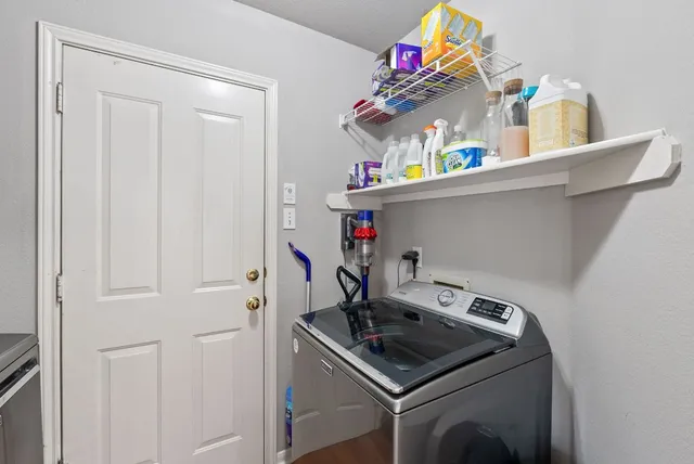 a view of backyard with a patio