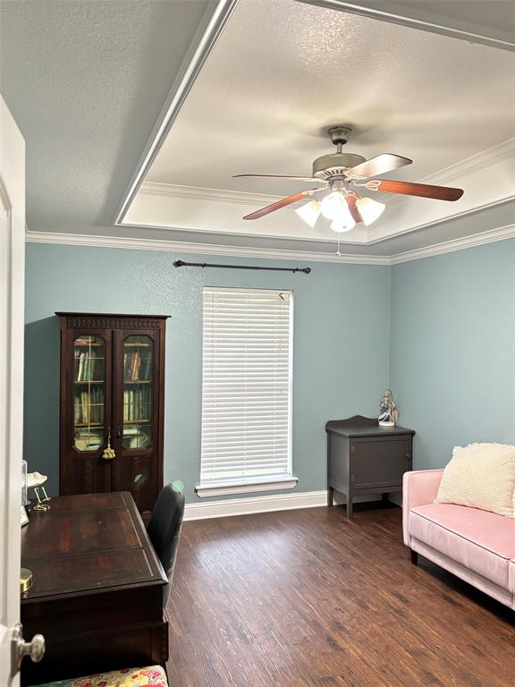 605 Jade Haughton, LA 71037 - Photo 20 of 34 4th Bedroom with Tray ceiling,crown molding, wood lamenant finish flooring,tray celing, ceiling fan, window with blinds, and light blue wall color