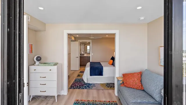 a living room with a large window with outer view