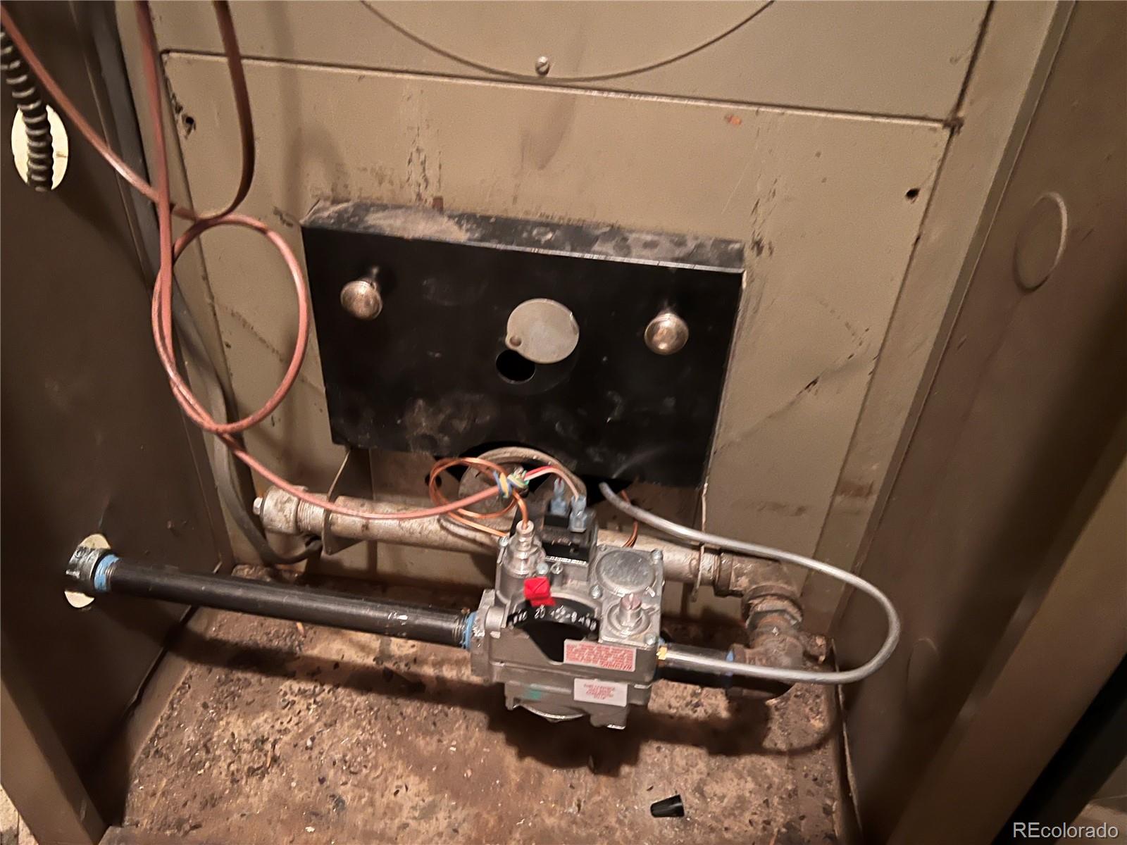 38563 Monroe Street Agate, CO 80101 - Photo 19 of 28 a bathroom with a sink mirror vanity and toilet
