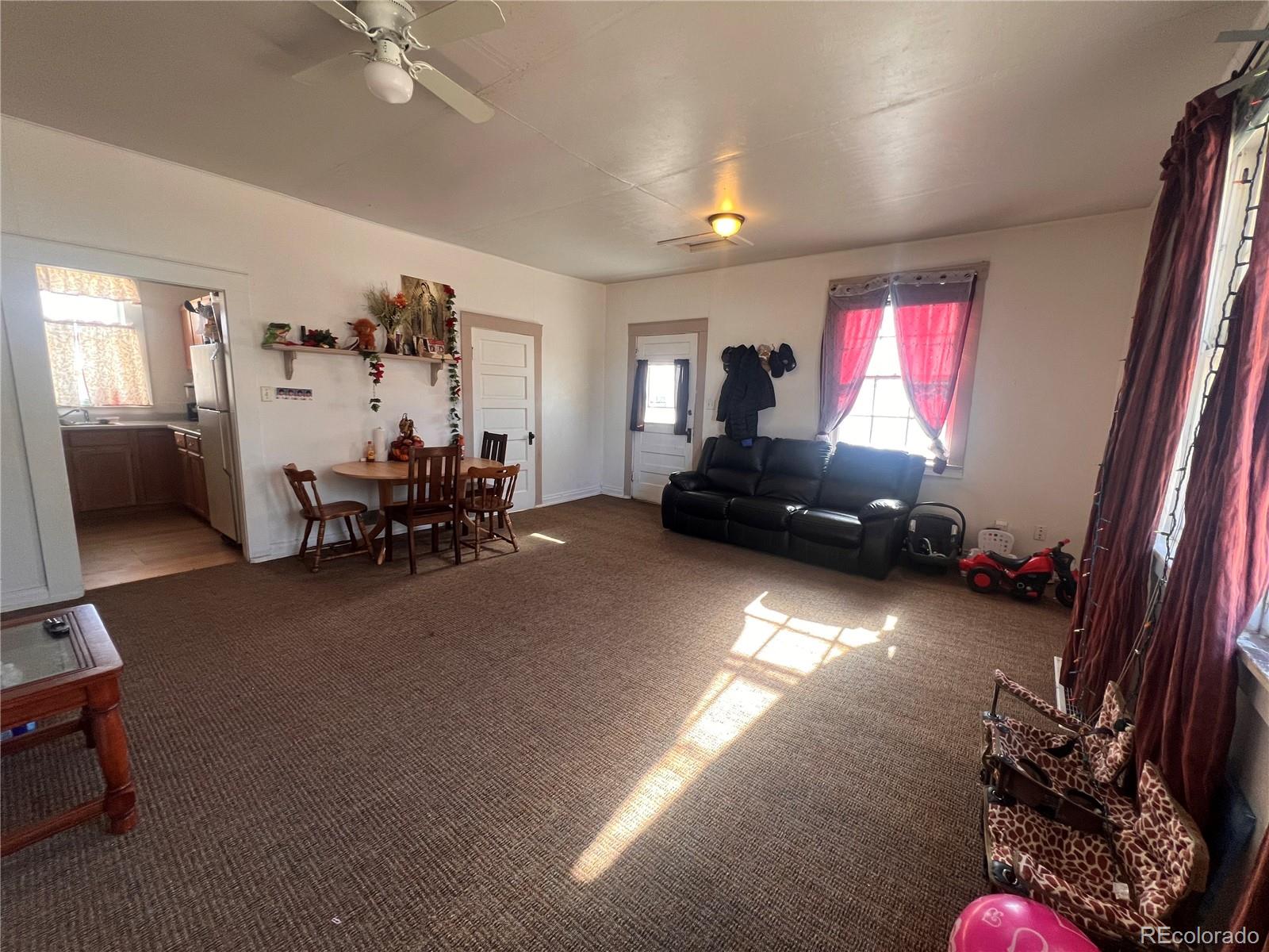 38563 Monroe Street Agate, CO 80101 - Photo 26 of 28 a living room with furniture and a window