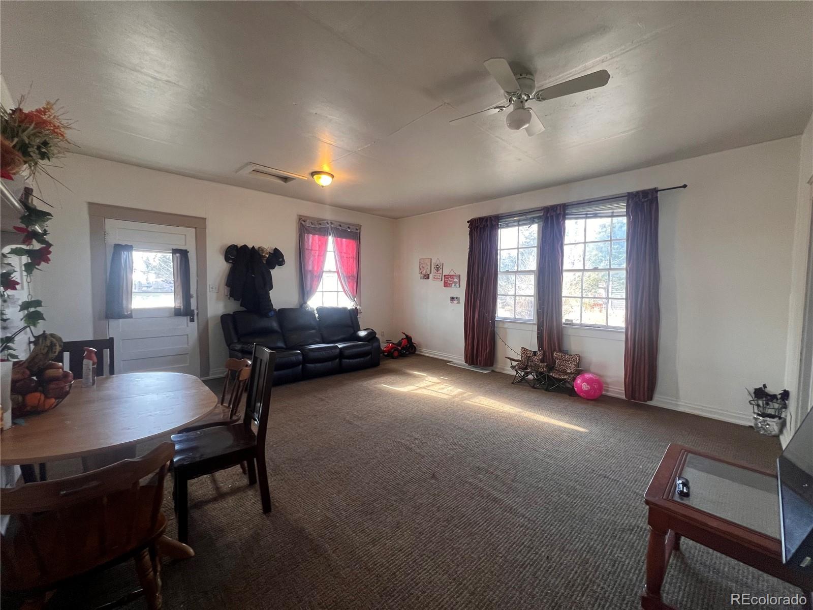 38563 Monroe Street Agate, CO 80101 - Photo 4 of 28 a room with furniture and tables in it