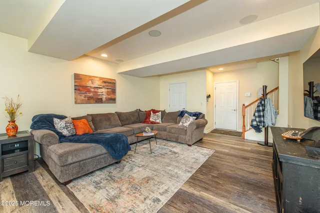a large kitchen with a table and chairs