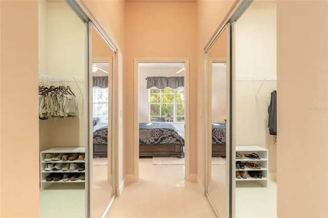 a bathroom with a granite countertop shower and a toilet