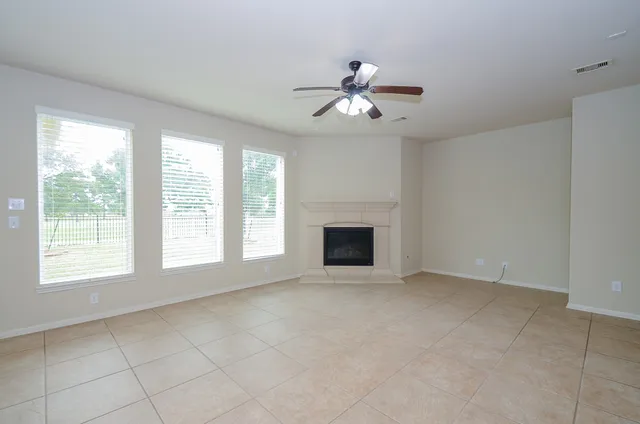a kitchen with stainless steel appliances granite countertop a sink and a stove