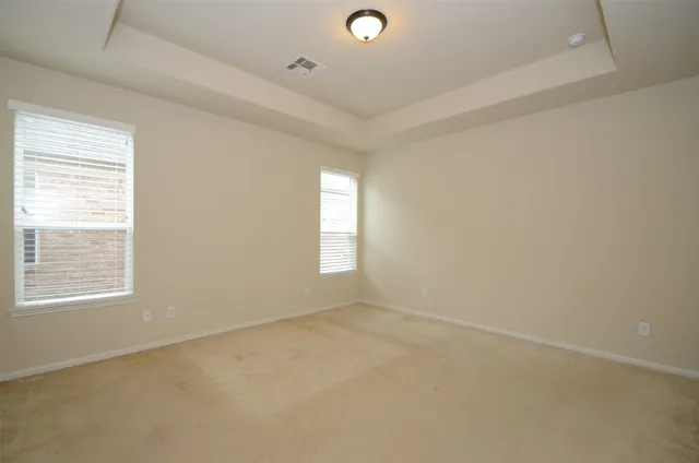 a bathroom with a double vanity sink a and mirror