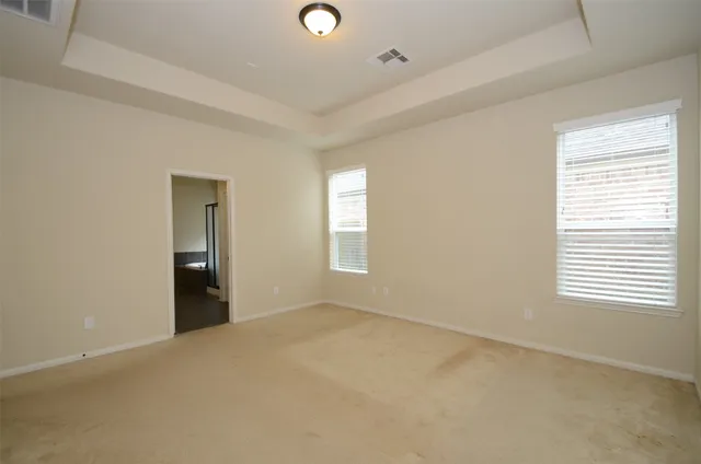 a bathroom with a double vanity sink and mirror