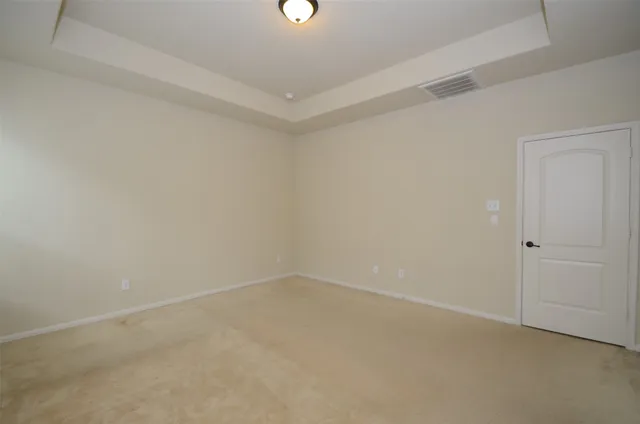 a bathroom with a tub and shower