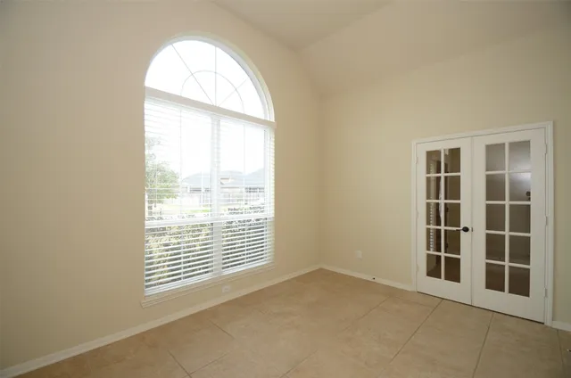 an empty room with windows