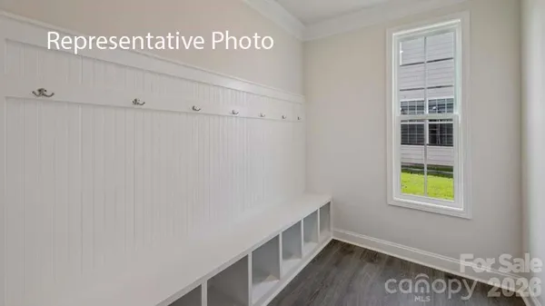 a view of a room that has a window in it