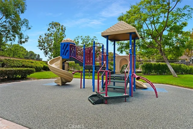 a view of outdoor space with playground and entertaining space