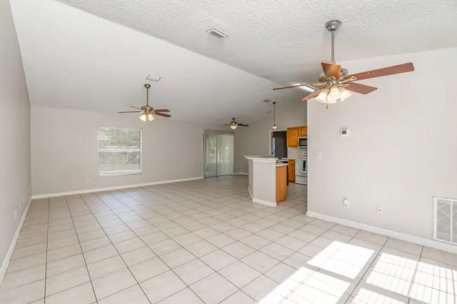 a view of a livingroom with a ceiling fan