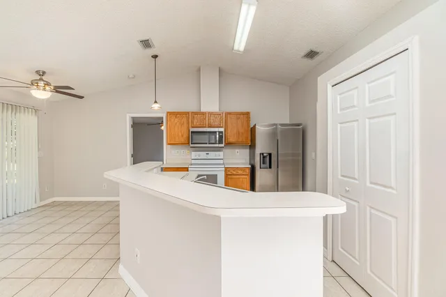a bathroom with a sink a vanity and a mirror