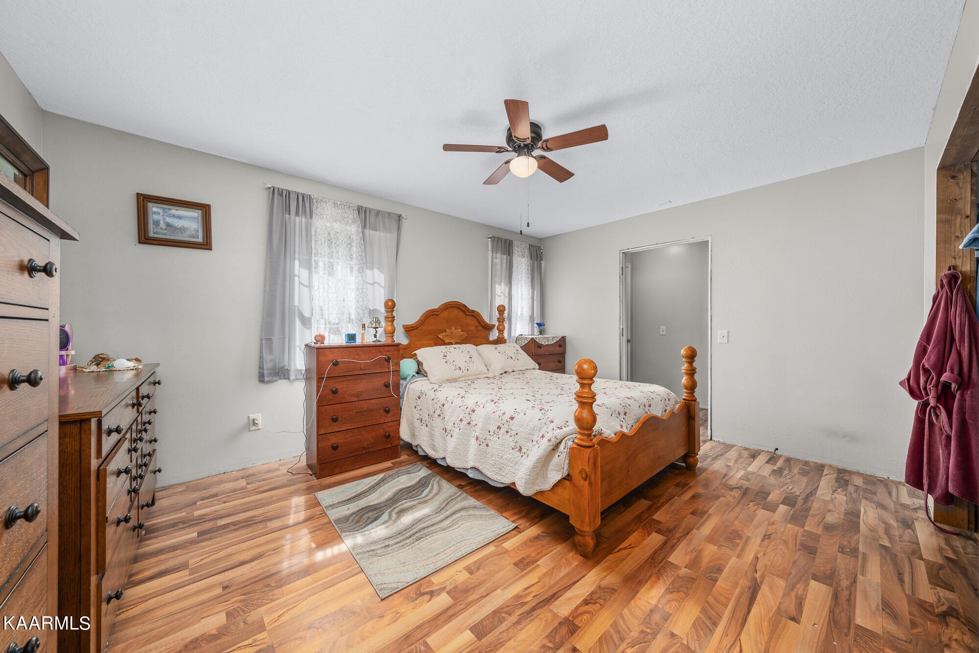 2371 Roslin Road Jamestown, TN 38556 - Photo 24 of 38 a bed room with a bed and a chandelier