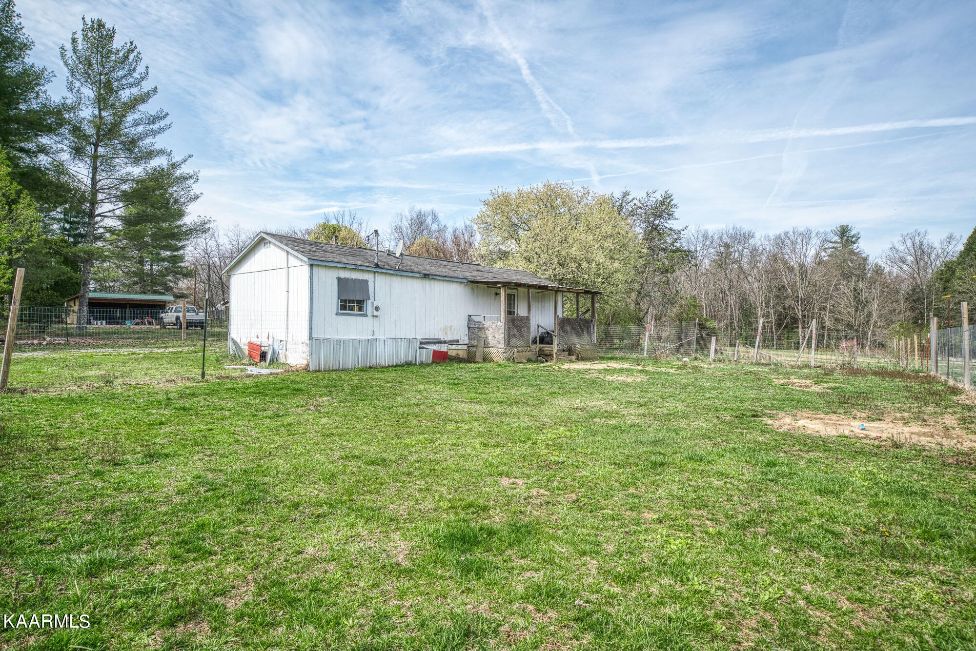 2371 Roslin Road Jamestown, TN 38556 - Photo 32 of 38 a view of a house with backyard