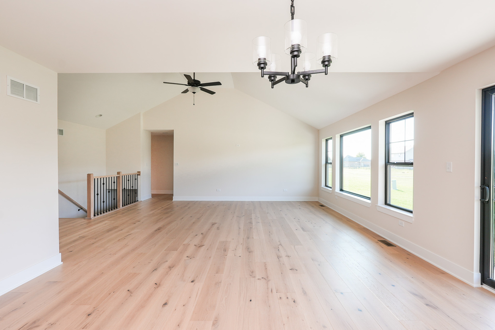985 Spring Street Manteno, IL 60950 - Photo 16 of 46 wooden floor in an empty room with a window