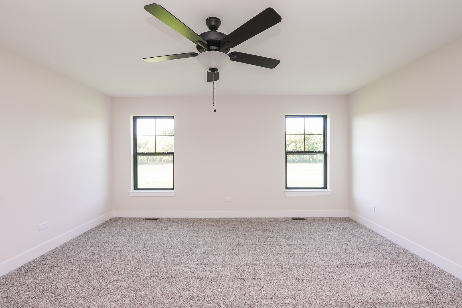 985 Spring Street Manteno, IL 60950 - Photo 24 of 46 an empty room with a window and a fan
