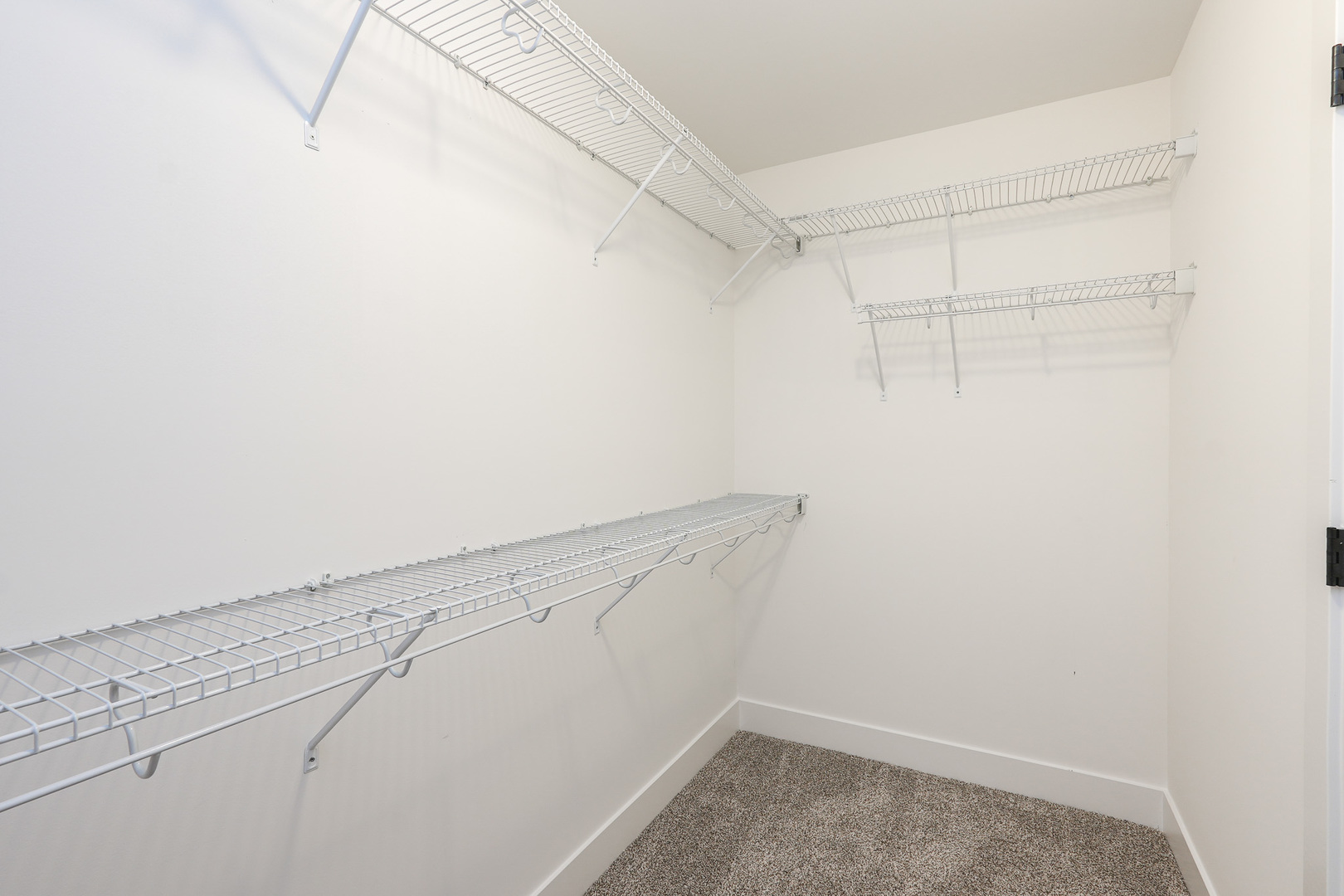 985 Spring Street Manteno, IL 60950 - Photo 29 of 46 a view of a room with racks on the wall