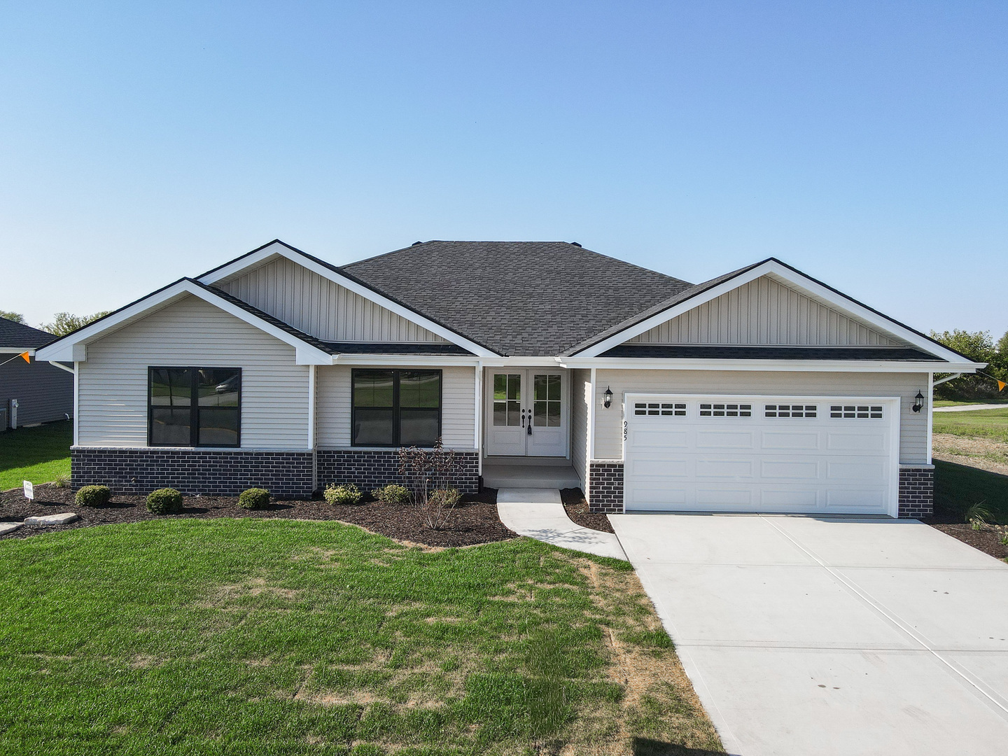985 Spring Street Manteno, IL 60950 - Photo 3 of 46 a front view of house with yard and green space