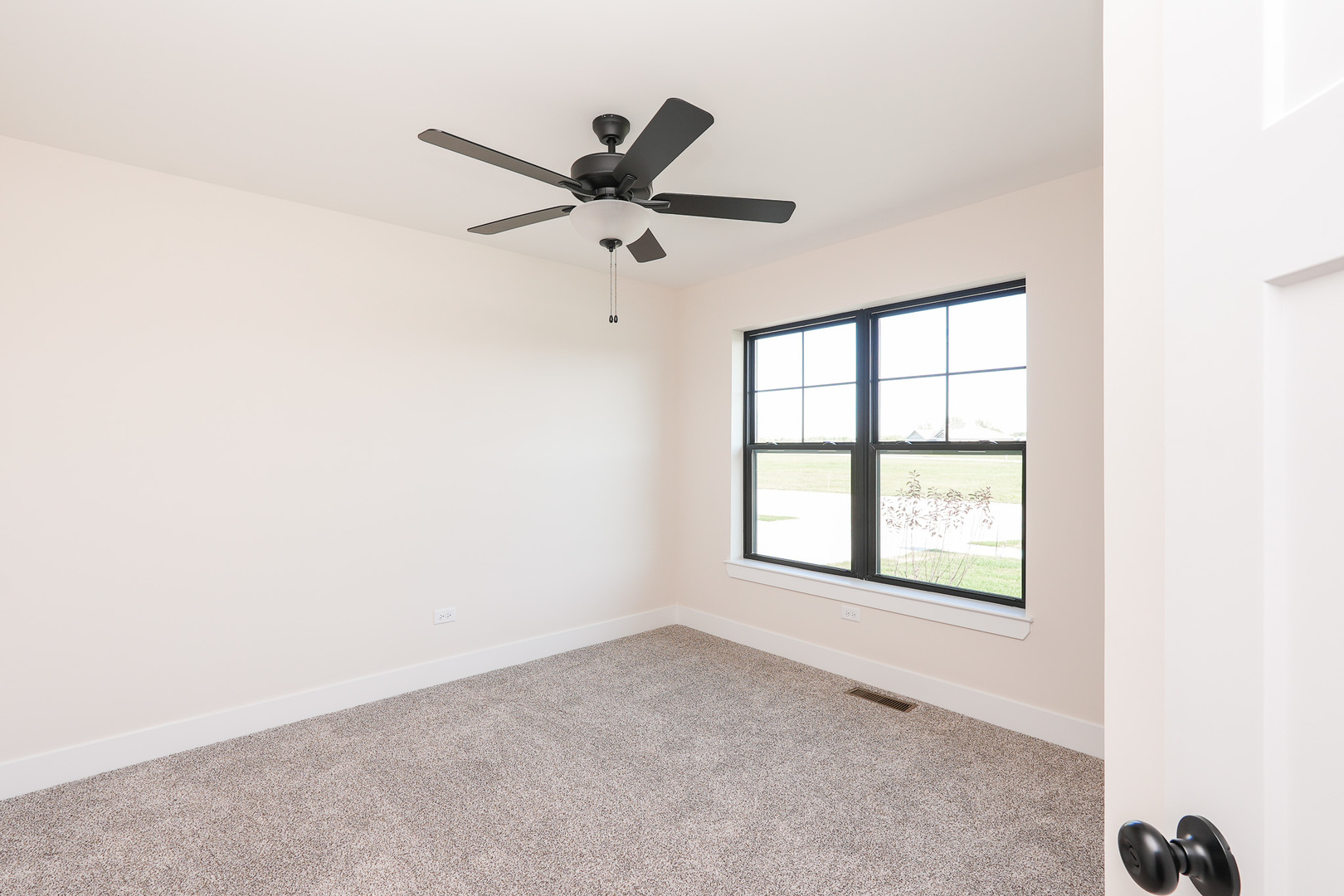 985 Spring Street Manteno, IL 60950 - Photo 34 of 46 a view of an empty room with a window