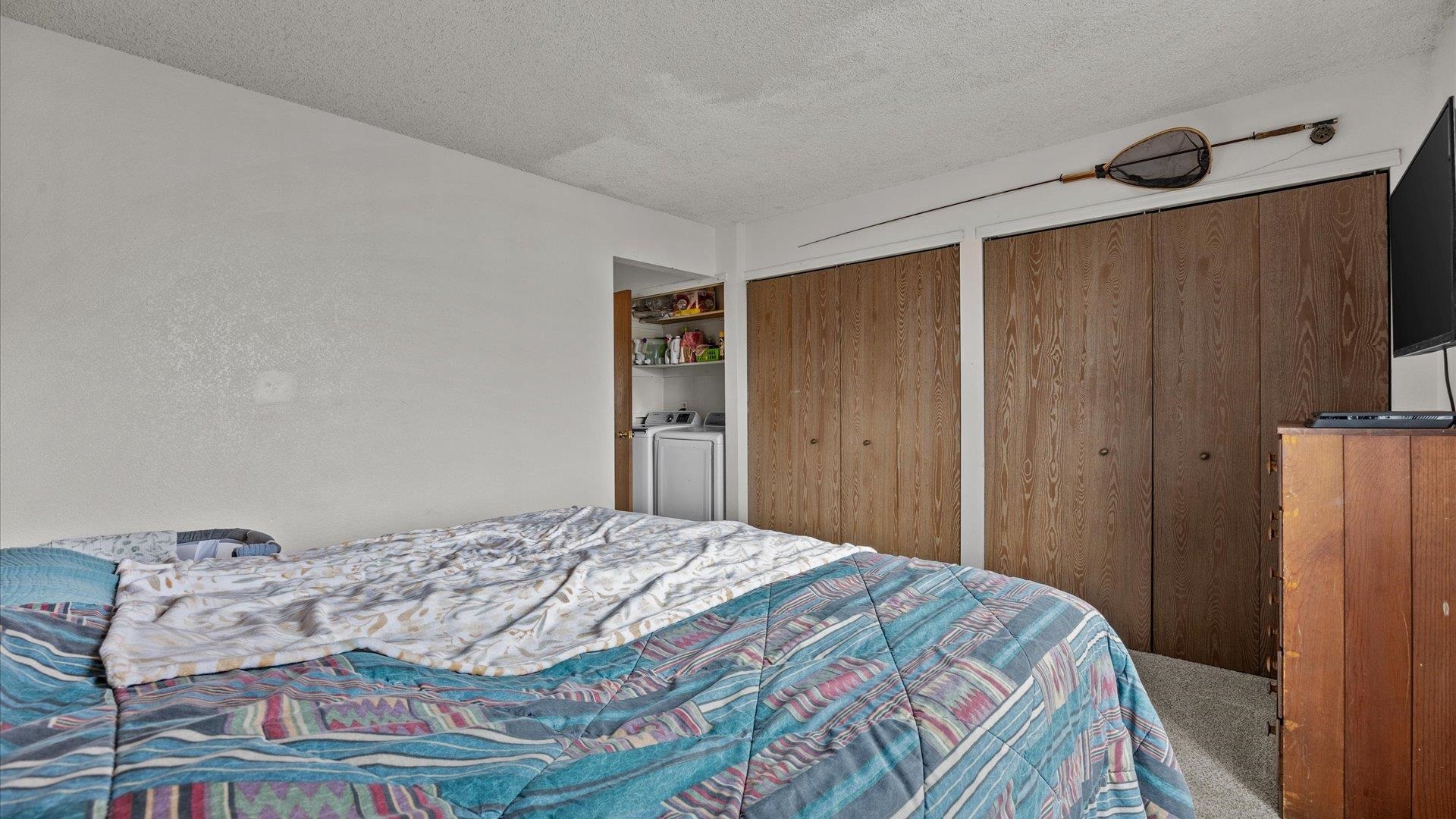 264 Coventry Court, Unit 32 Grand Junction, CO 81503 - Photo 11 of 17 a bedroom with a bed and a window