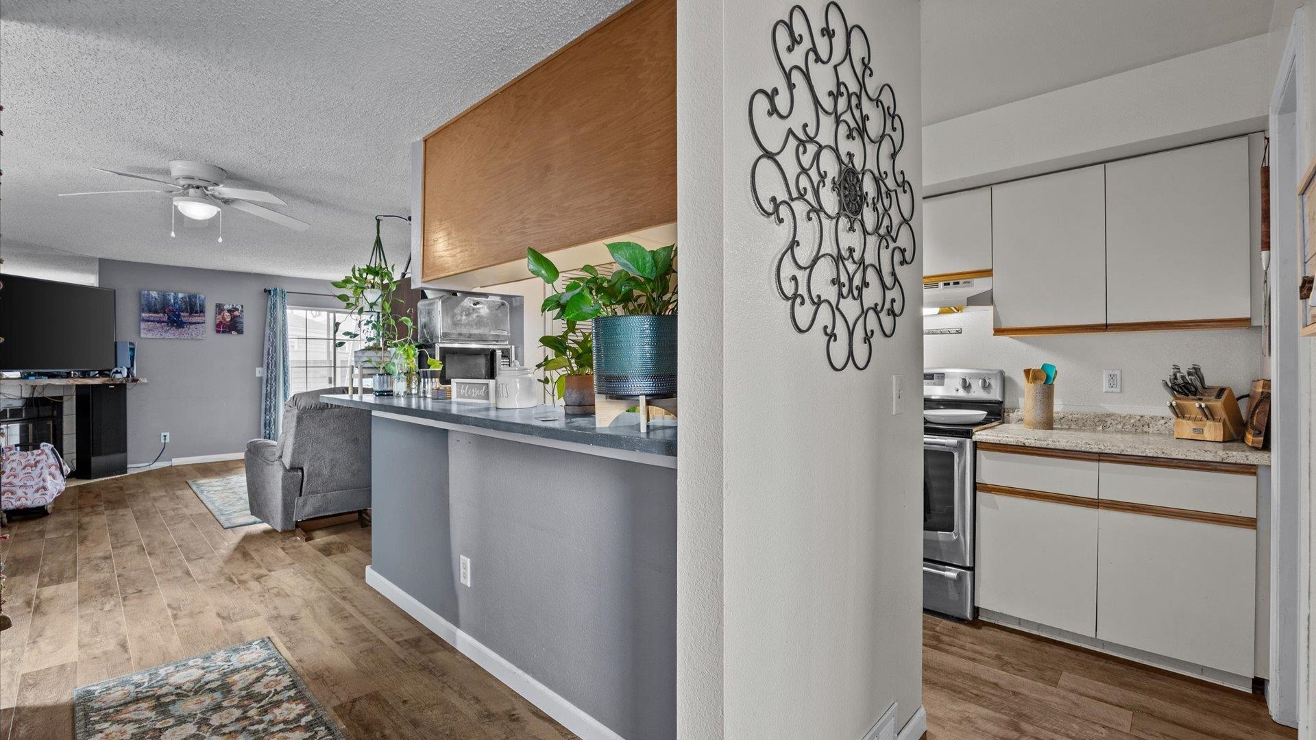 264 Coventry Court, Unit 32 Grand Junction, CO 81503 - Photo 7 of 17 a kitchen with a sink and cabinets