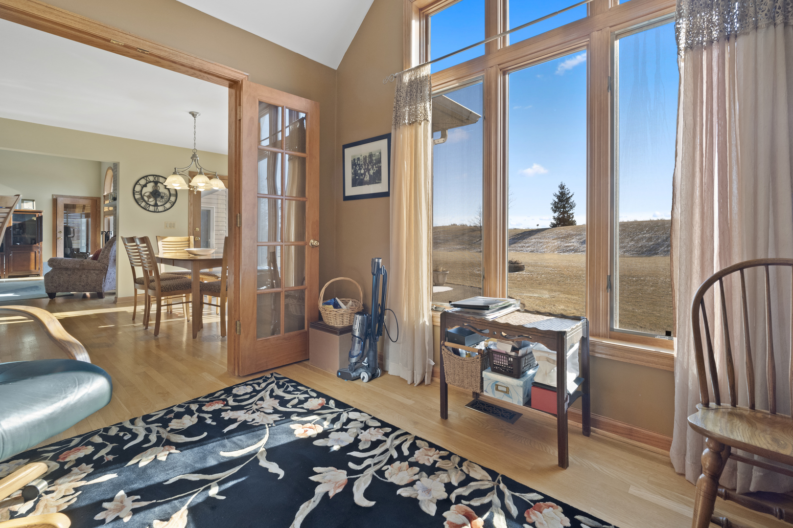 8202 Eagle Ridge Spring Grove, IL 60081 - Photo 18 of 44 a living room with furniture and a floor to ceiling window