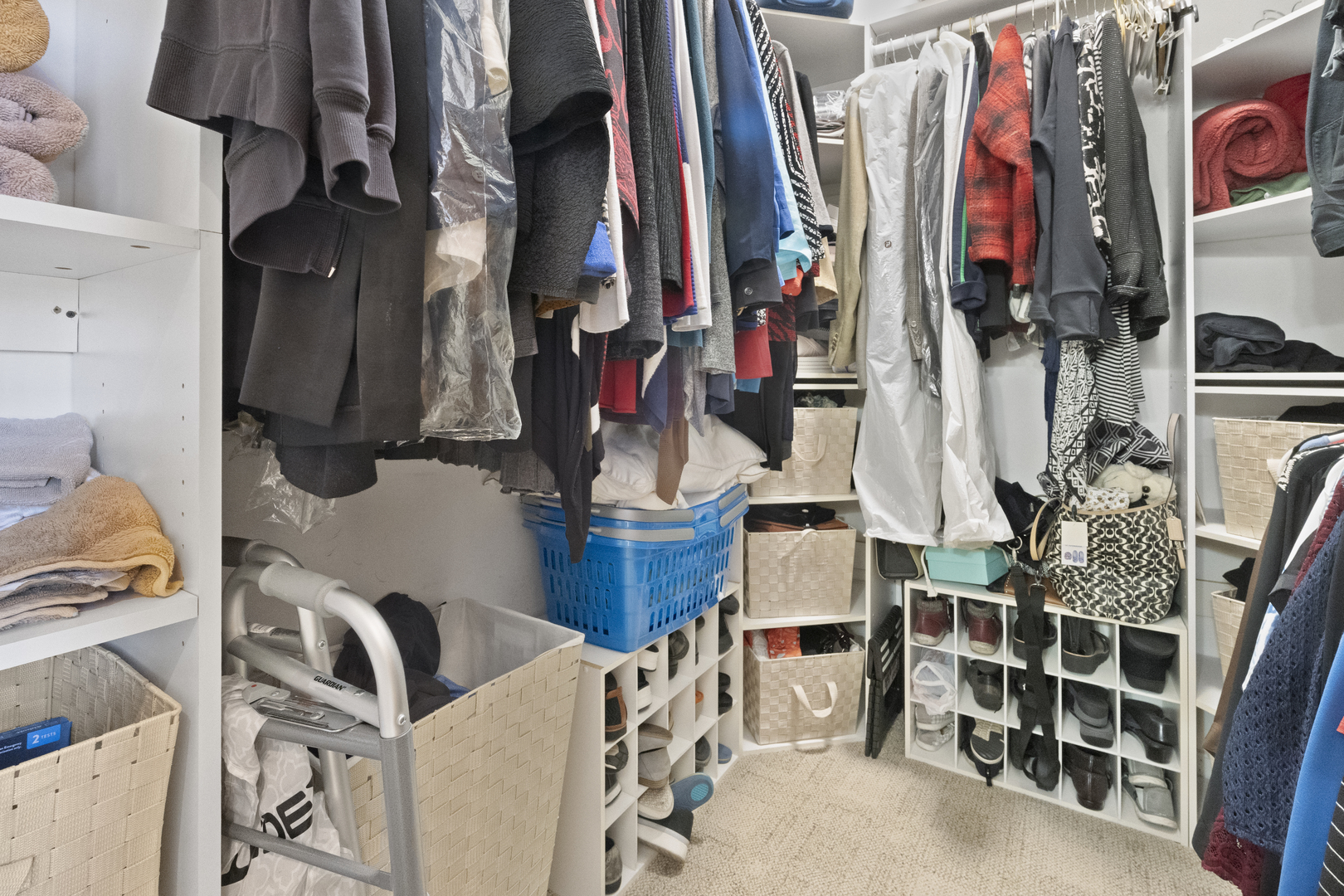 8202 Eagle Ridge Spring Grove, IL 60081 - Photo 25 of 44 a view of walk in closet with clothes and shoes