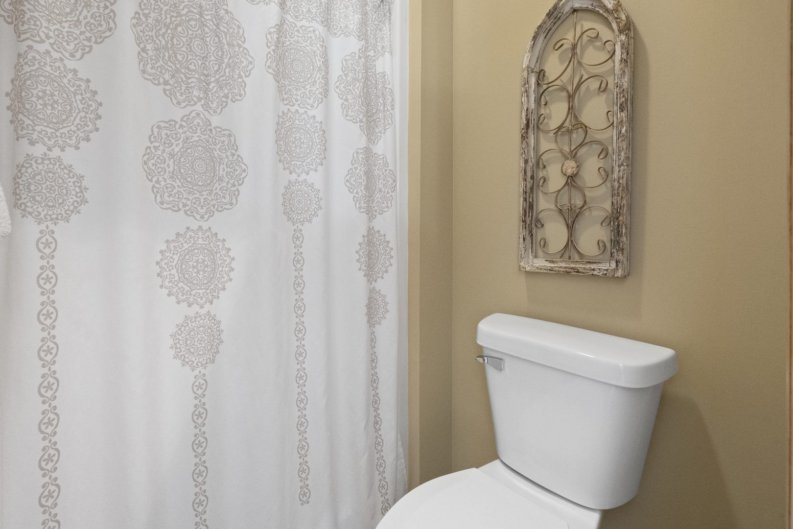 8202 Eagle Ridge Spring Grove, IL 60081 - Photo 26 of 44 a white toilet sitting next to a shower curtain