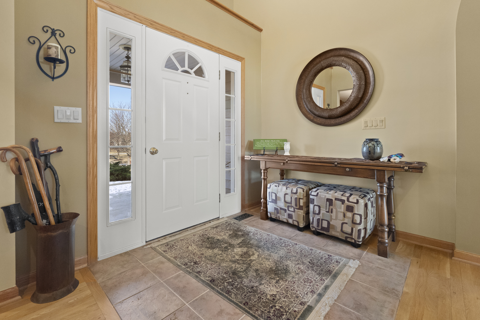 8202 Eagle Ridge Spring Grove, IL 60081 - Photo 3 of 44 a front view of a house with entryway wooden floor and a table chair