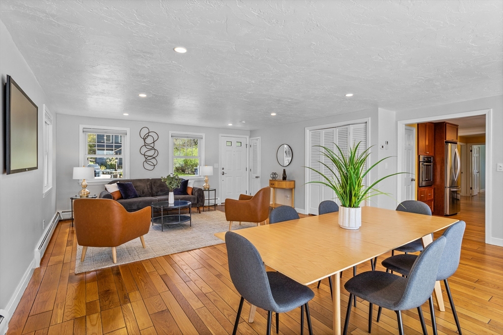 17 Hamblen Street Lexington, MA 02421 - Photo 14 of 42 a view of a dining room with furniture and wooden floor
