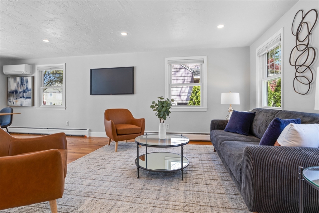 17 Hamblen Street Lexington, MA 02421 - Photo 17 of 42 a living room with furniture and a window