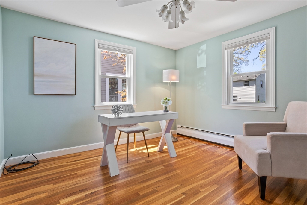 17 Hamblen Street Lexington, MA 02421 - Photo 20 of 42 a workspace with wooden floor