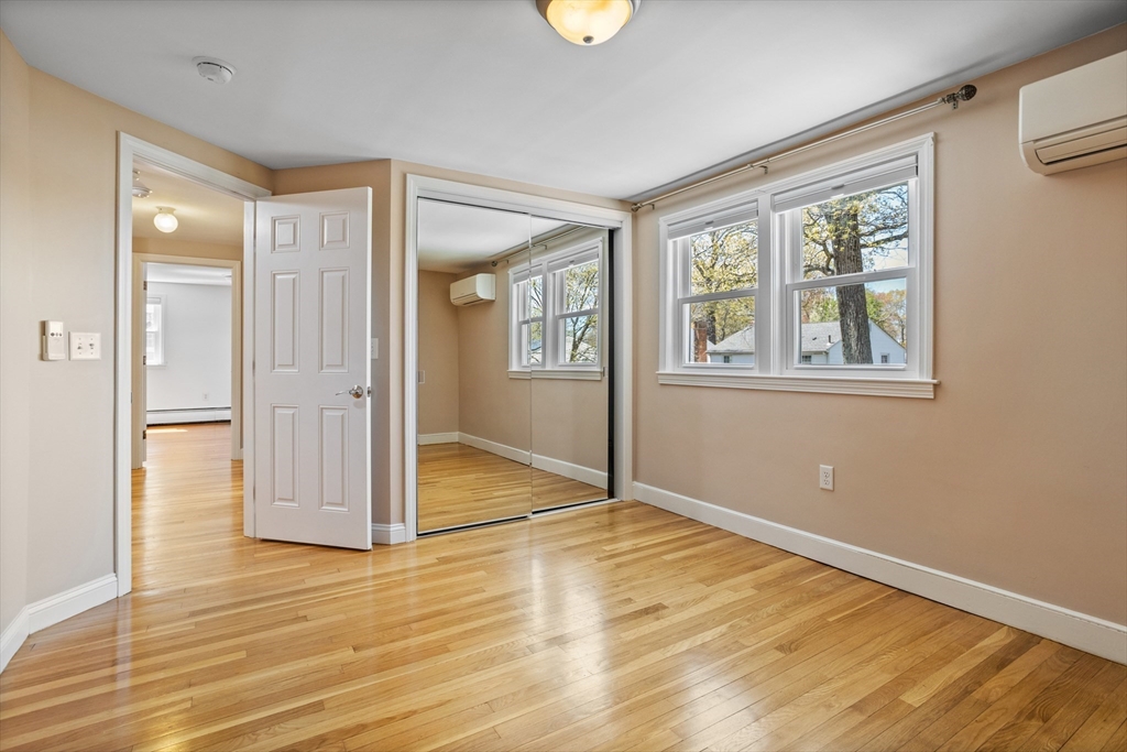 17 Hamblen Street Lexington, MA 02421 - Photo 28 of 42 a view of empty room with wooden floor and fan