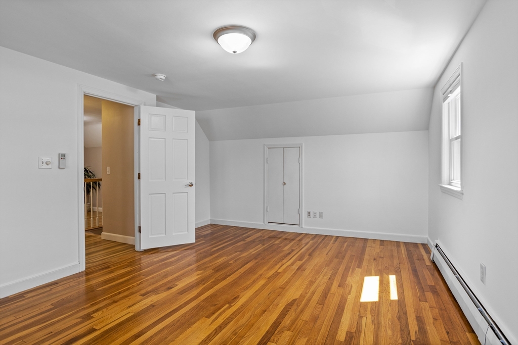 17 Hamblen Street Lexington, MA 02421 - Photo 32 of 42 wooden floor in an empty room