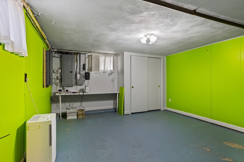 17 Hamblen Street Lexington, MA 02421 - Photo 36 of 42 a view of a room with gym equipment