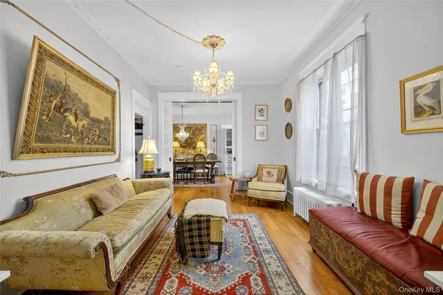 a living room with furniture or couch and a window